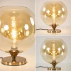 amber_glazen_tafellamp_me_3.webp Flash Sale Straluma Amber glazen tafellamp met gouden voet