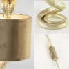gouden_tafellamp_snake_me_3.webp Sale Straluma Gouden tafellamp Snake met velours kap