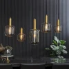 grote_hanglamp_lekar_lich_4.webp New Straluma Grote hanglamp Lekar 5-lichts antiek brons met smoke glas