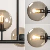 grote_lichts_hanglamp_mat_3.webp Fashion Straluma Grote 10-lichts hanglamp mat zwart met smoke glazen bollen