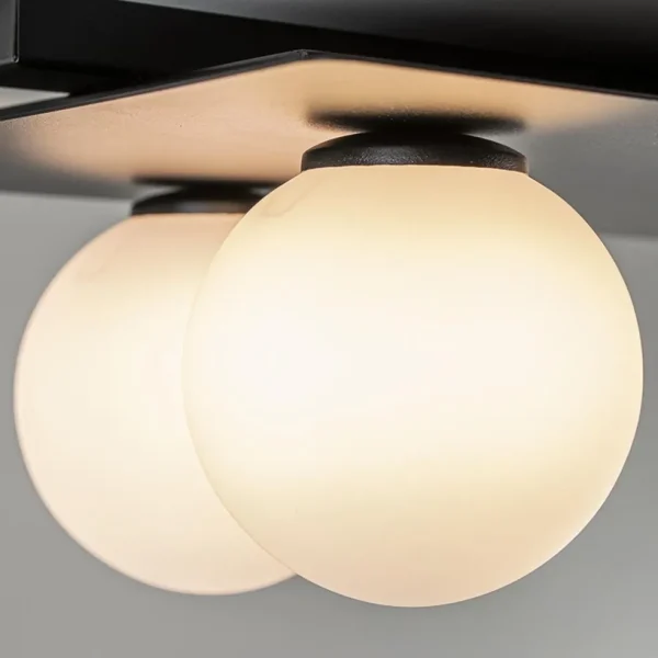 grote_plafondlamp_rechtho_2.webp Store Straluma Grote plafondlamp rechthoekig zwart met witte bollen