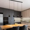 lichts_eettafelhanglamp_m_4-6.webp Discount Straluma 4-Lichts eettafelhanglamp mat zwart met goud