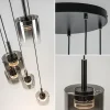 lichts_ronde_hanglamp_zwa_2.webp Flash Sale Straluma 5-Lichts ronde hanglamp zwart met titanium/helder glas