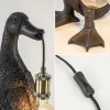 light_and_living_tafellam_2-12.webp Shop Straluma Light and Living tafellamp Duck mat zwart met brons