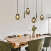 luxe_lichts_hanglamp_met__4.webp Clearance Straluma Luxe 6-lichts hanglamp met goud glas en cilinders