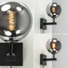 mat_zwarte_wandlamp_met_s_3.webp Best Sale Straluma Mat zwarte wandlamp met smoke glazen bol 20 cm