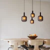 ovale_lichts_hanglamp_zwa_4.webp Shop Straluma Ovale 4-lichts hanglamp zwart met mat zwart glas