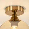 plafondlamp_toilet_goud_m_2.webp Discount Straluma Plafondlamp toilet goud met amber glas